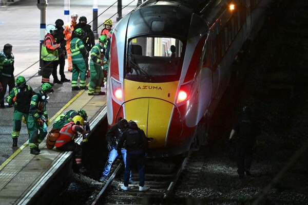 Two men arrested after stabbing incidents on train near Cambridge